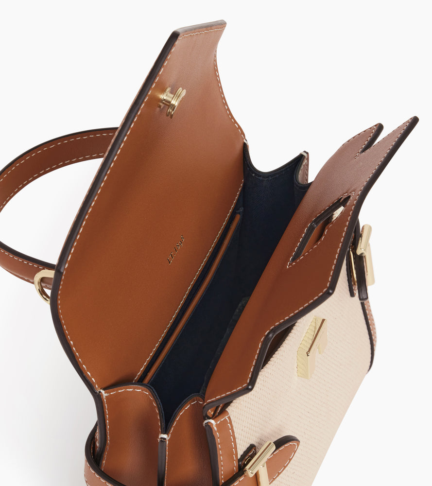 Bolso de mano pequeño Emilie con doble solapa de lona de algodón y cuero liso